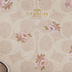 Coach Outlet Corner Zip Wristlet In Signature Canvas With Floral Print