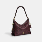 Coach Outlet Laurel Shoulder Bag With Buckles In Signature Canvas